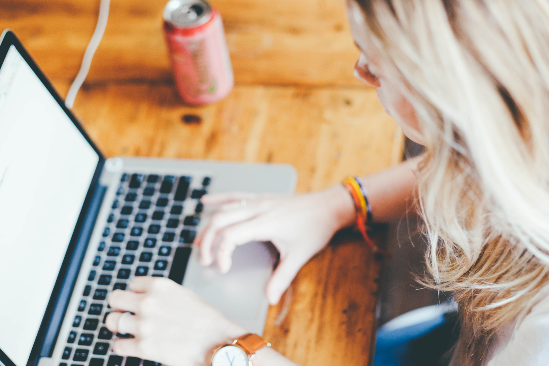 Woman typing on keyboard